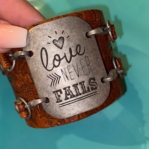 Brown leather wrap with adjustable strap